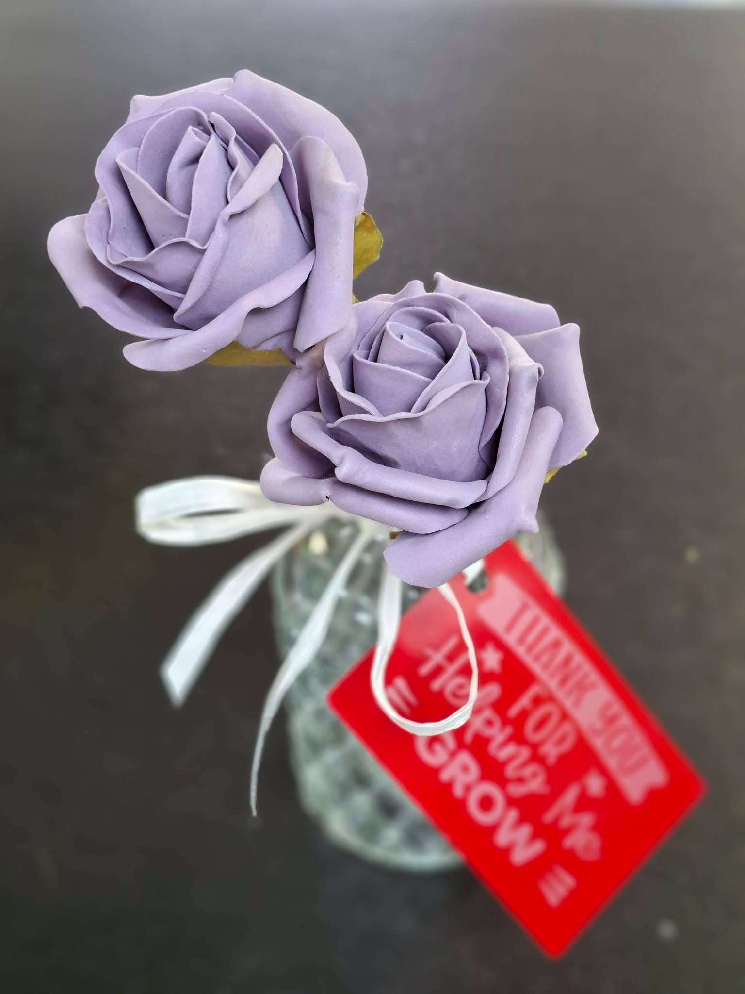 Lavender roses with gift tag